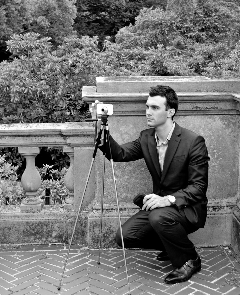 Photo of Matthew James photographing the south side of Westbury House. Taken by James Andrew.