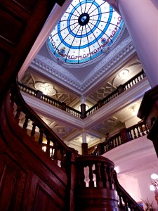 Picture of staircase leading from first to second floor, third floor, and fourth floor dome. 