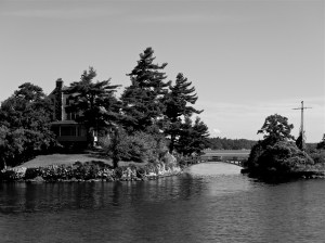 The smallest international bridge in North America. The home site on a Canadian island and has a stepping bridge connecting to a tiny American island. 