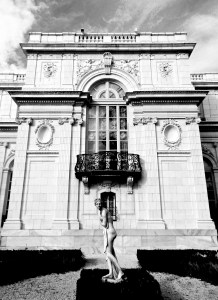 Staircase window looking out over rose garden. 